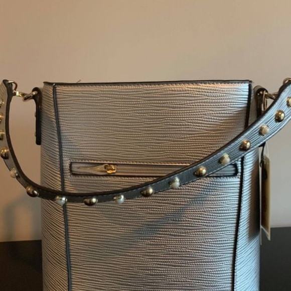 Handbags - New Silver Handbag. Crossbody strap included